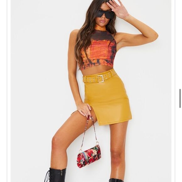 PrettyLittleThing Dresses & Skirts - NWT🔥 Mustard Faux Leather Belted Mini Skirt - Pretty Little Thing